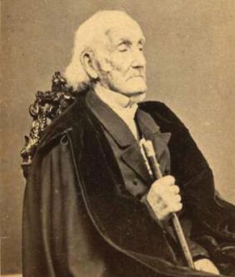 Portrait of Revolutionary War Veteran Daniel Waldo sitting in a chair holding his cane.